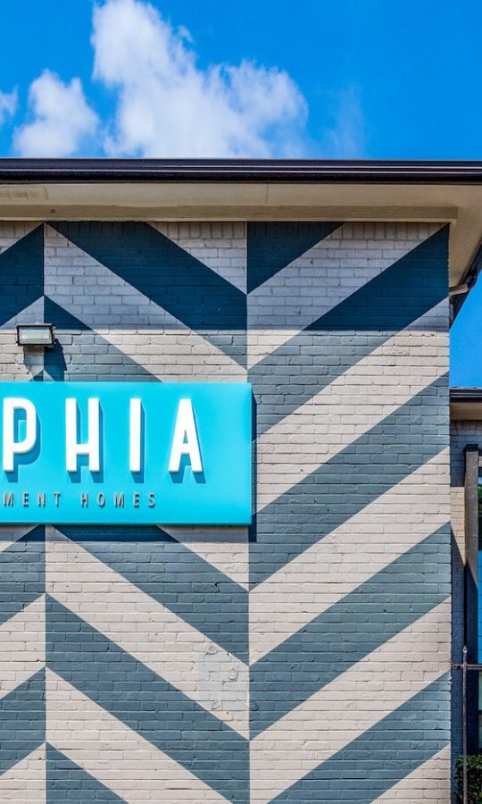 the sign for sophia's restaurant in a parking lot at The  Sophia